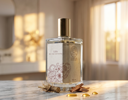 Svara alcohol-free oil-based perfume bottle on marble with botanicals, clean beauty fragrance India